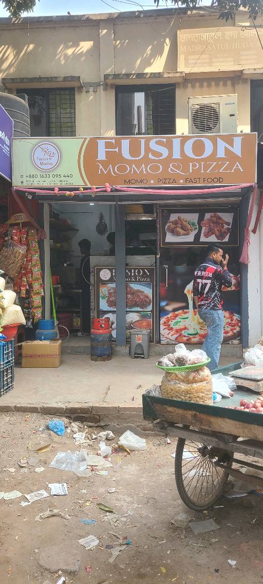 Fusion Momo & Pizza - Photo 1