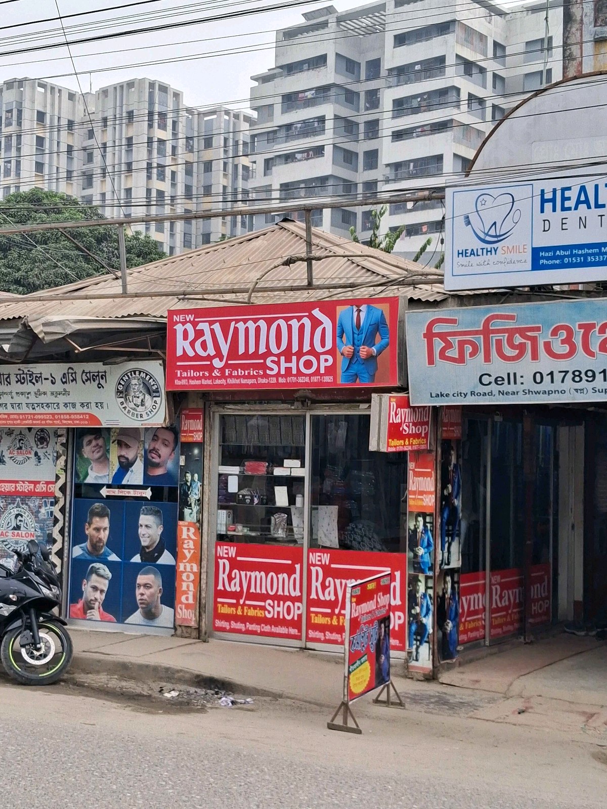 New Raymond Tailors And Fabrics Shop - Photo 1