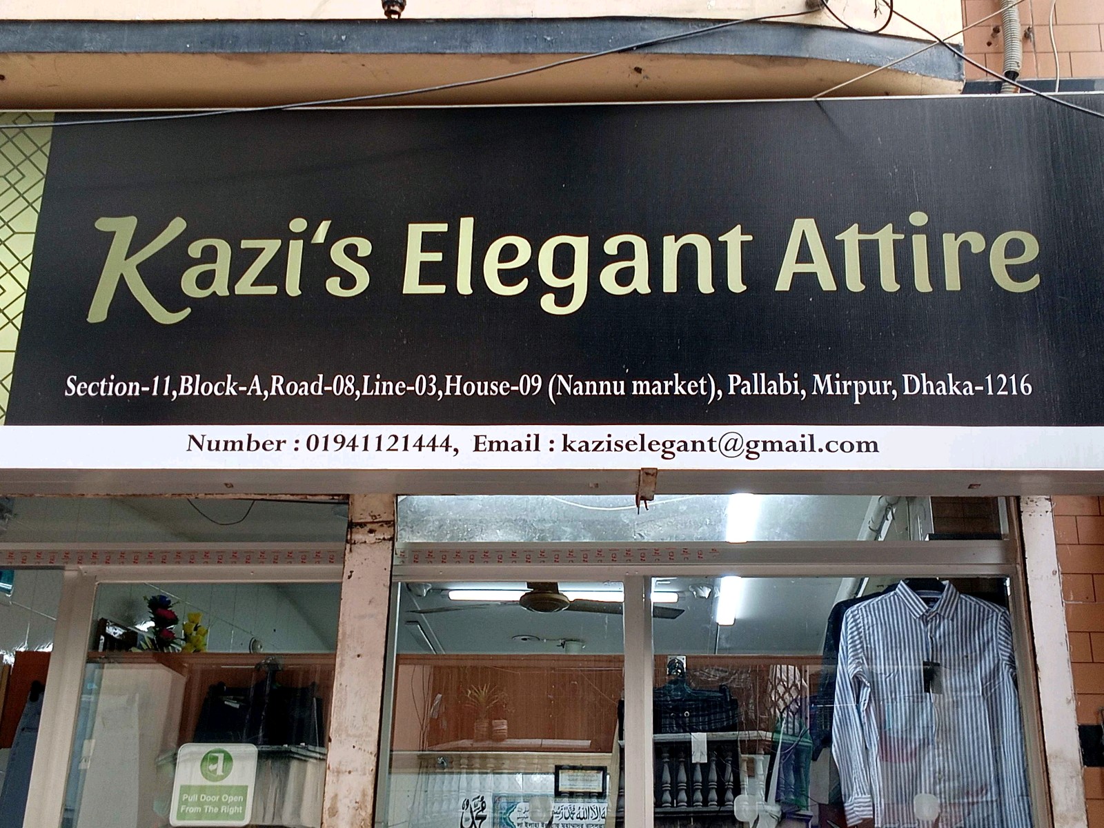 Kazi's Elegant Attire - Photo 1