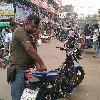 Mechanic repairing bike