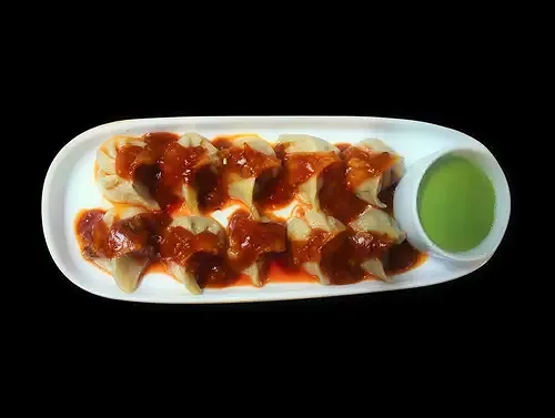 Chilli Schezwan Momo image 1